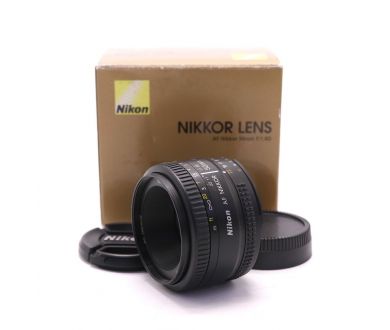 Объектив Nikon 50mm f/1.8D AF Nikkor в упаковке