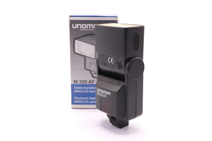 Фотовспышка Unomat M320AF в упаковке