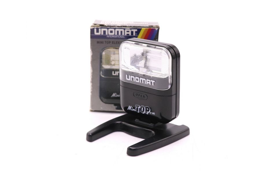 Фотовспышка Unomat Mini Top F140 в упаковке