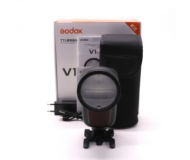 Фотовспышка Godox V1 C для камер Canon в упаковке