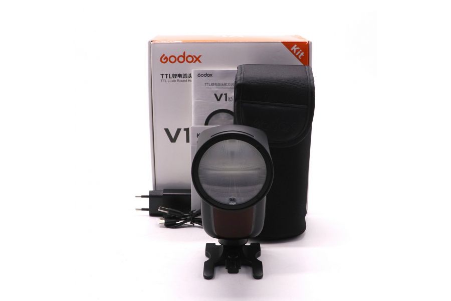 Фотовспышка Godox V1 C для камер Canon в упаковке