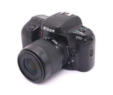 Nikon F50 + Nikon 35-80/4-5.6D (Japan, 1995)